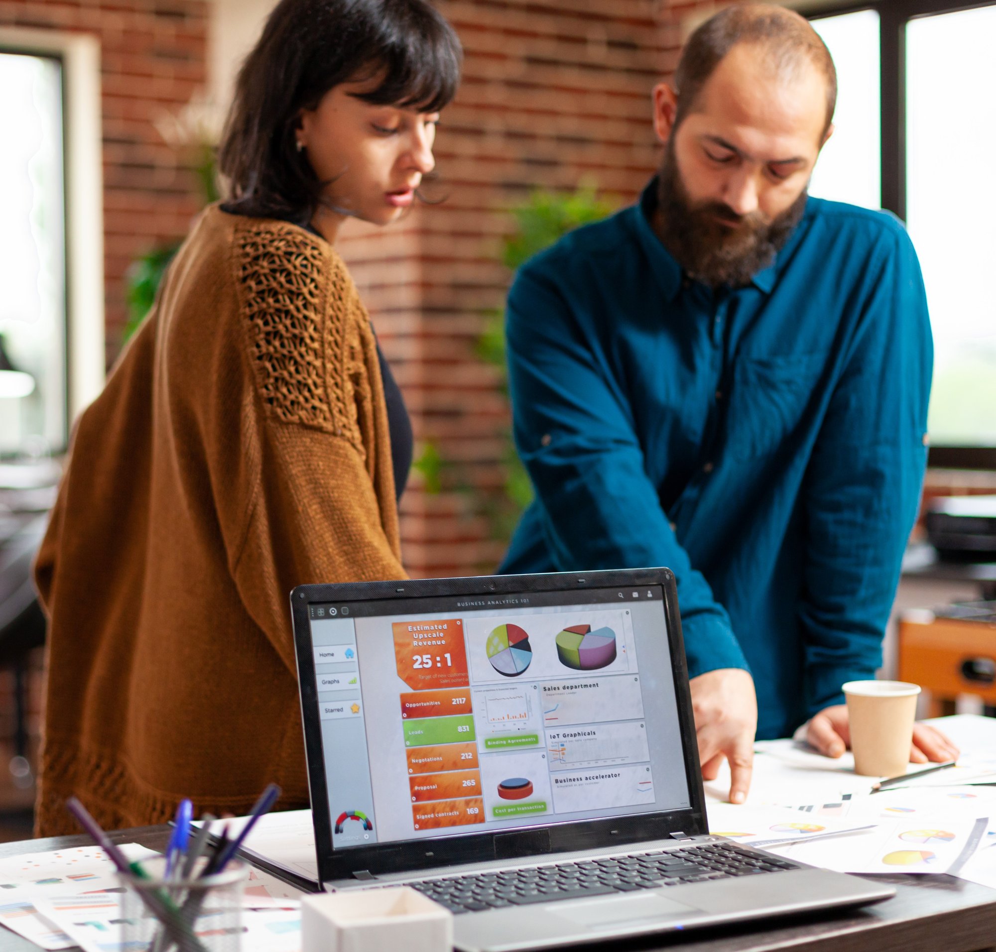 businesspeople-analyzing-management-documents-discussing-company-strategy-while-brainstorming-ideas-business-project-startup-office-laptop-computer-with-marketing-data-chart-screen-1