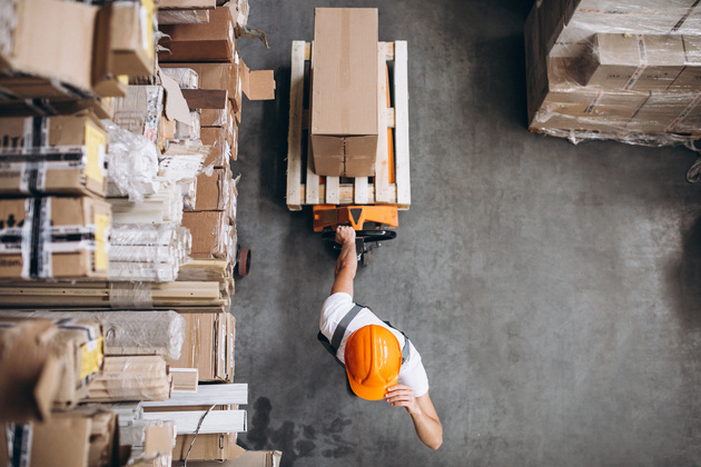 young-man-working-warehouse-with-boxes-4