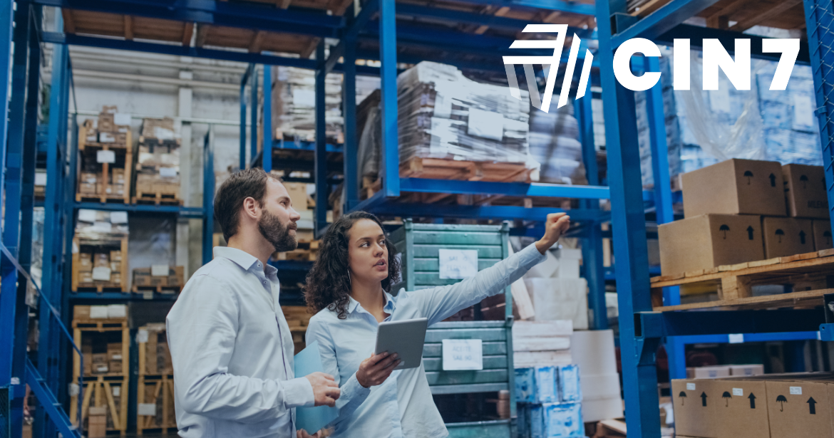 A warehouse worker using Cin7 inventory management system for small businesses, showcasing organized shelves and streamlined operations.